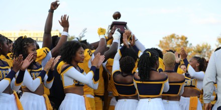 Team Celebrates with the Commemorative CLassic Trophy