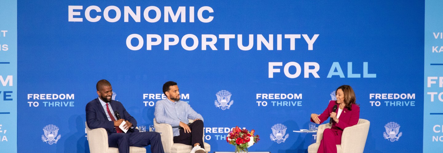 Vice President Kamala Harris speaks with actor Michael Ealy and political analyst Bakari Sellers
