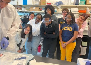 Zoe watching a demonstration