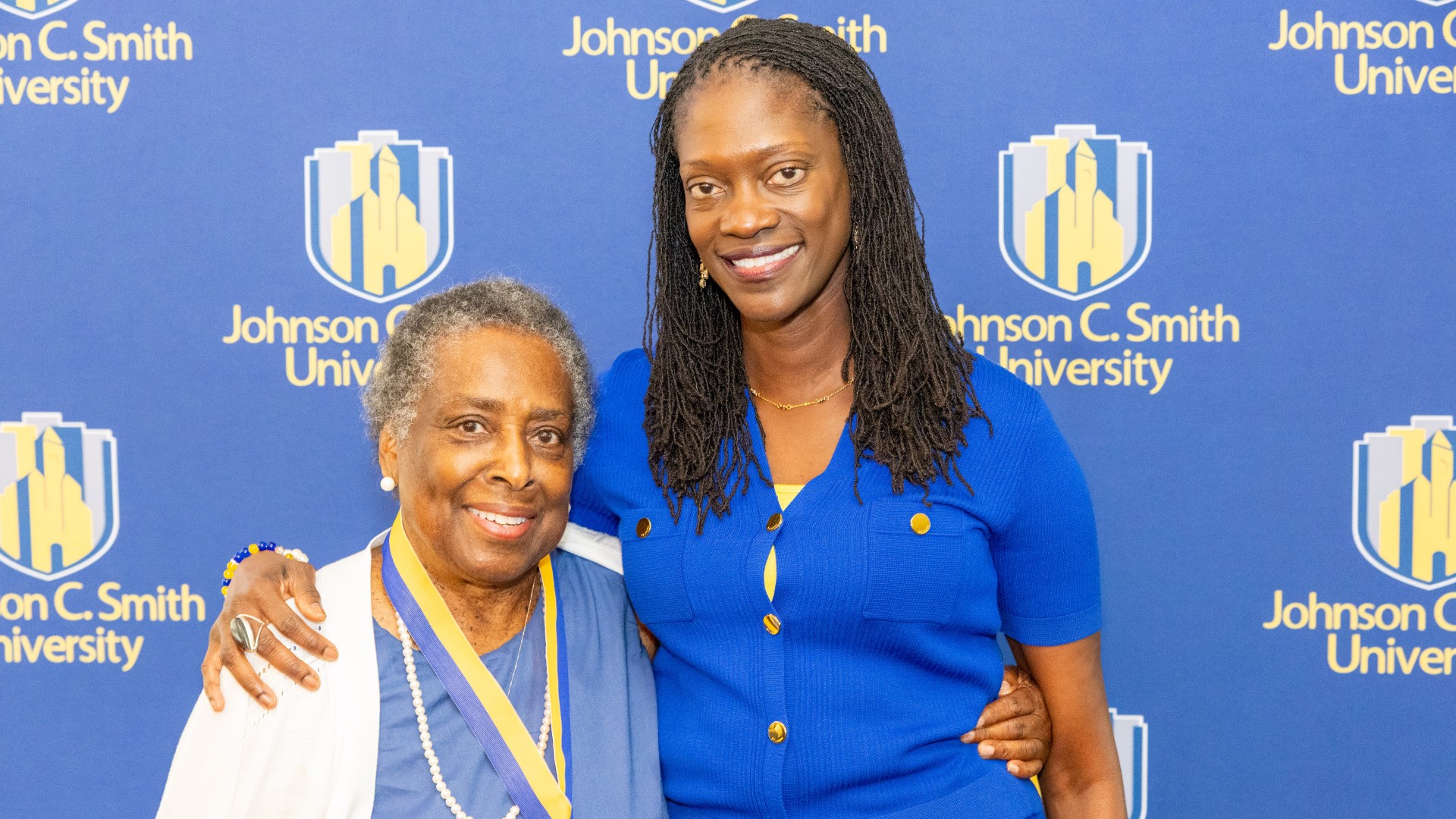 Golden Class medallion with President Kinloch Photos