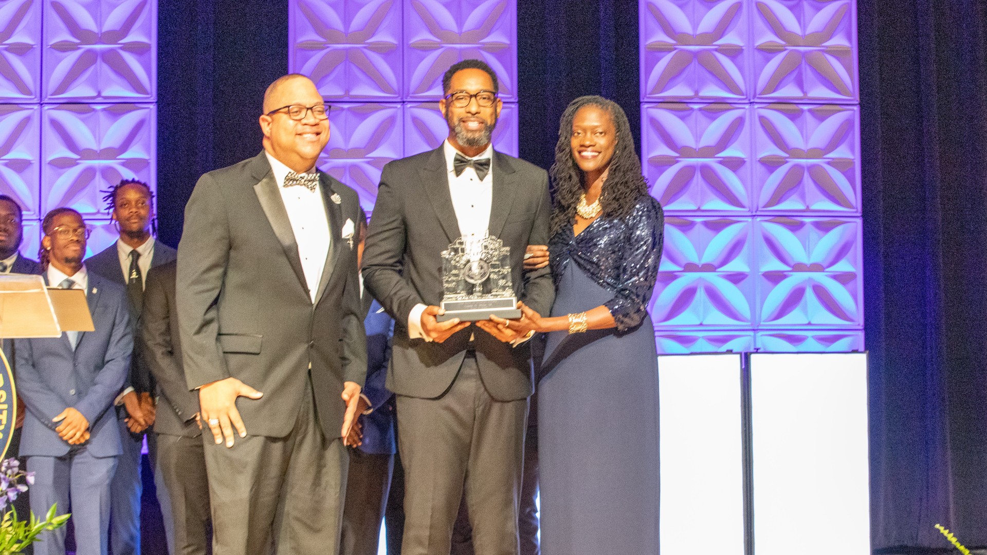 Lex Bibbs with Dr. Kinloch and Fernando Little accepting the award