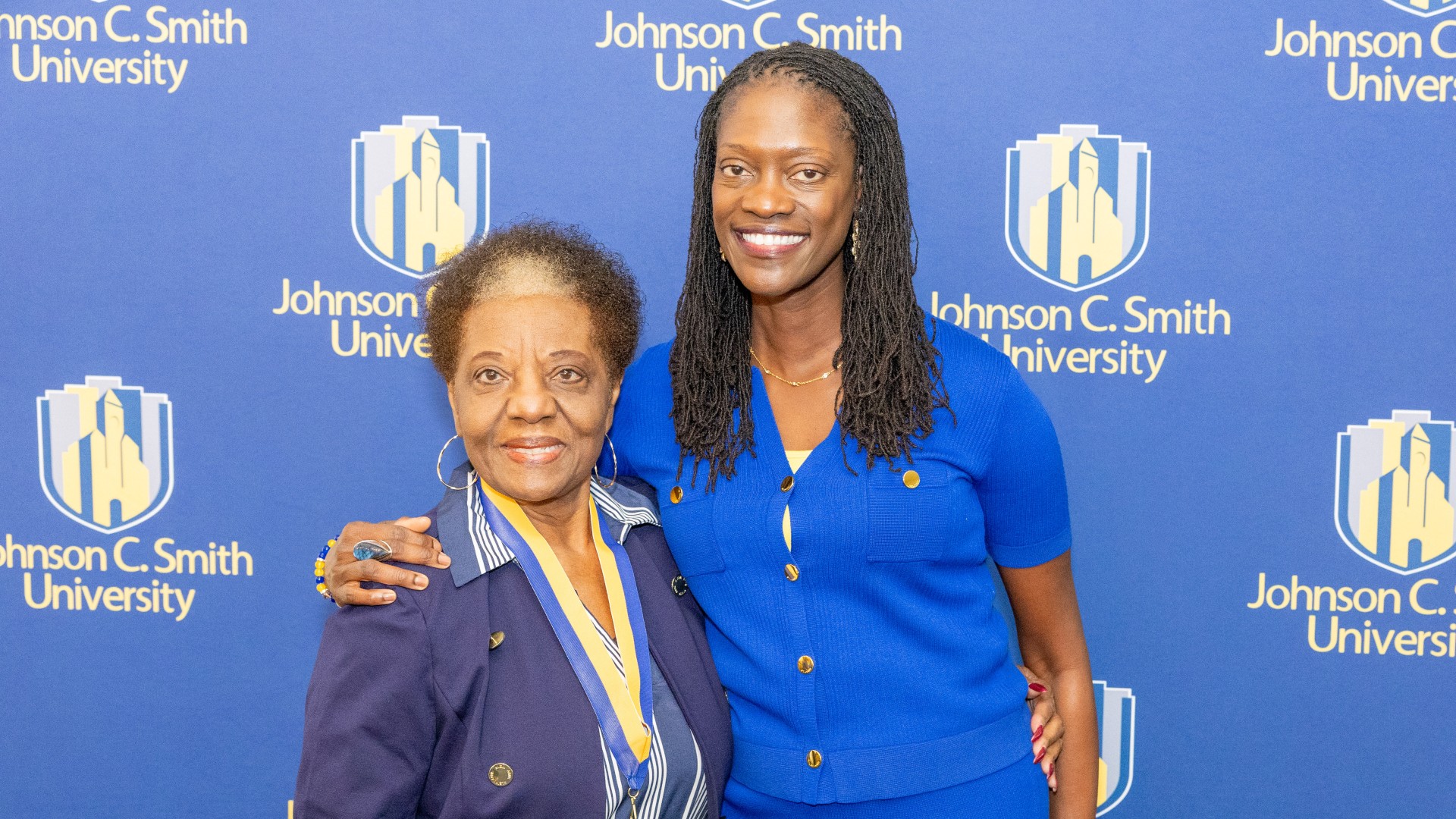 Golden Class medallion with President Kinloch Photos