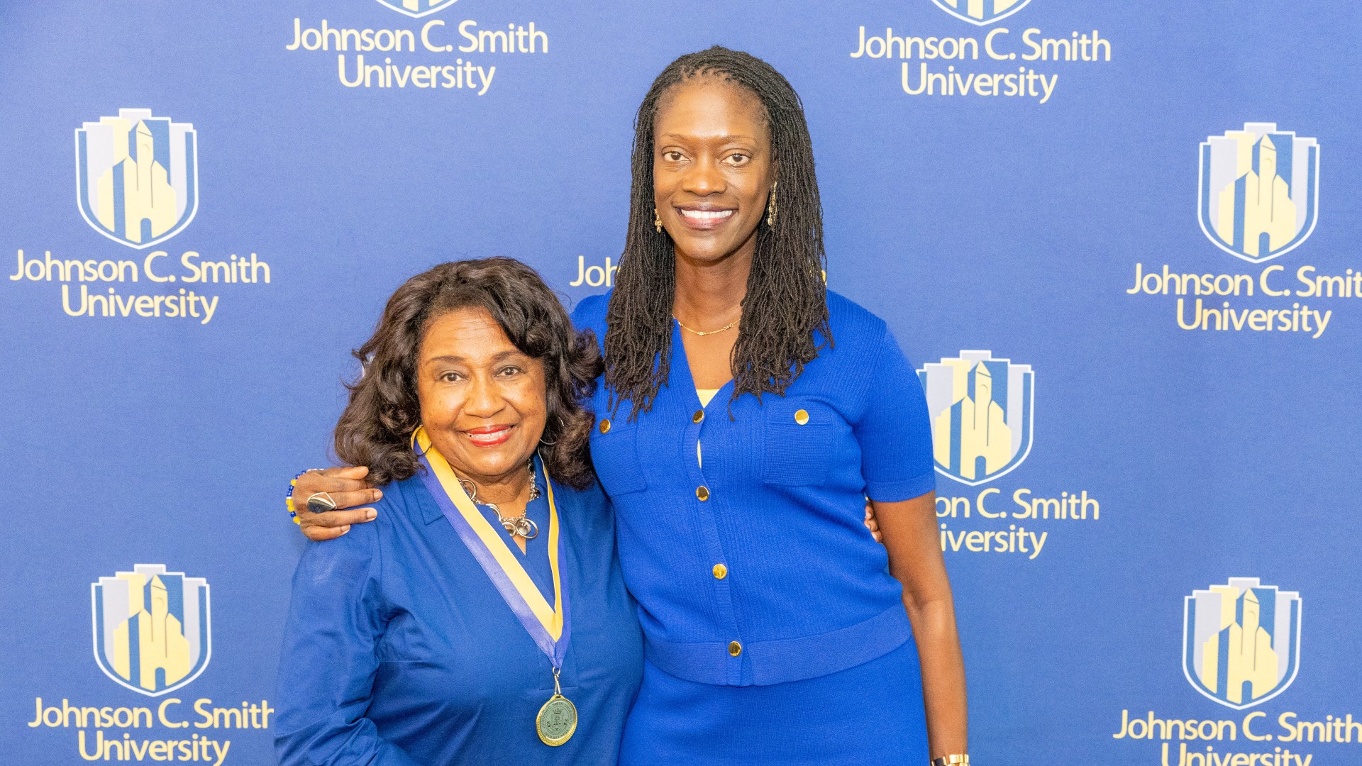 Golden Class medallion with President Kinloch Photos