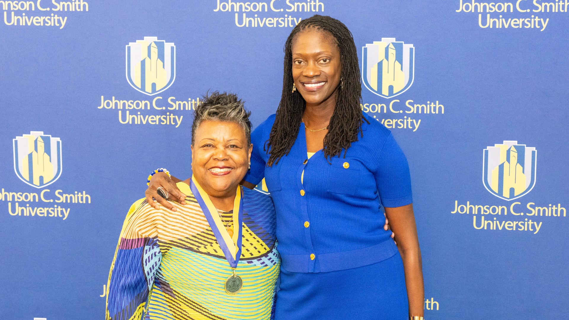 Golden Class medallion with President Kinloch Photos