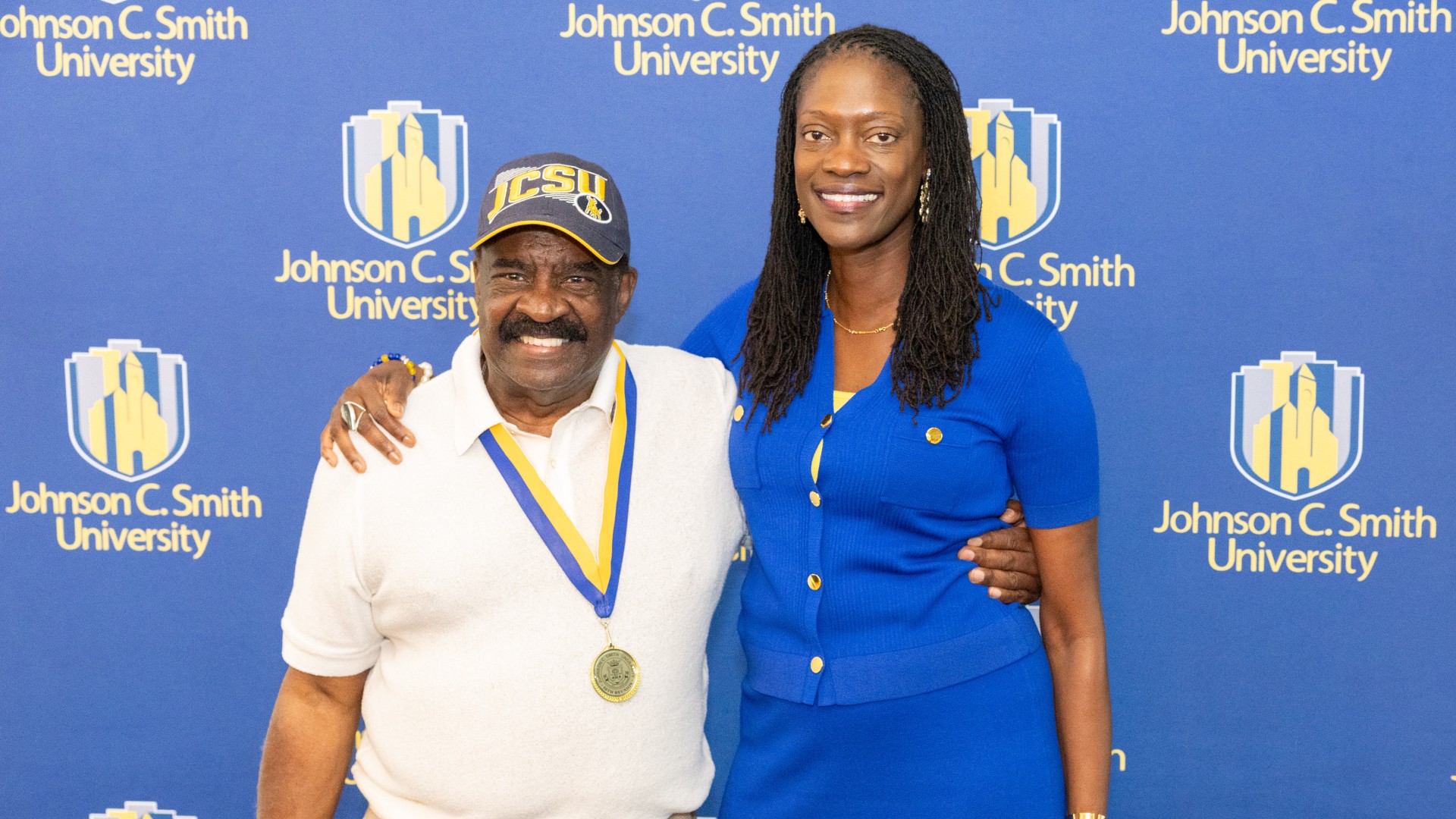 Golden Class medallion with President Kinloch Photos