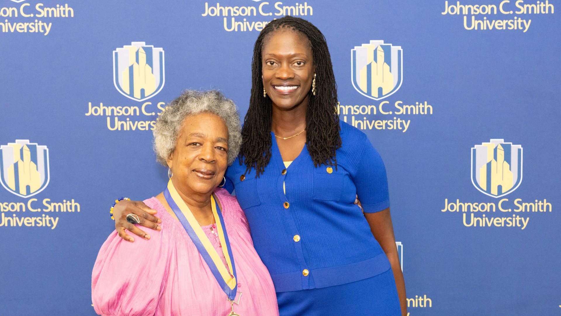 Golden Class medallion with President Kinloch Photos