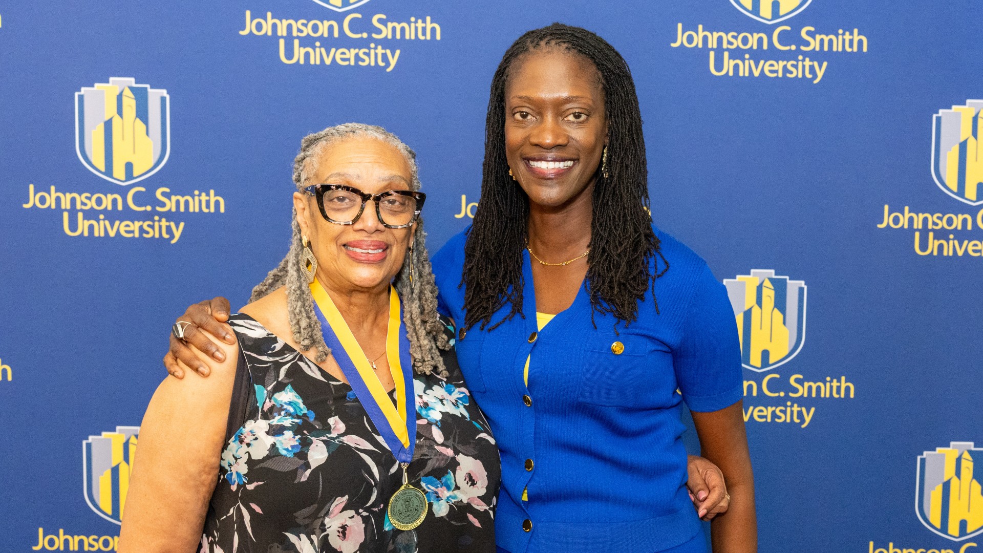 Golden Class medallion with President Kinloch Photos