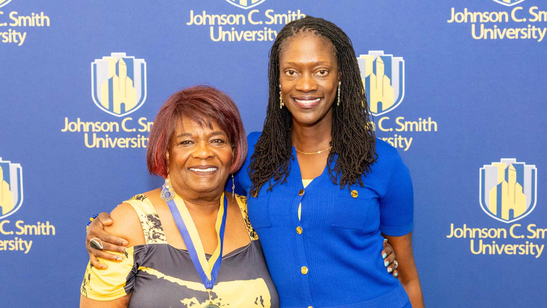 Golden Class medallion with President Kinloch Photos