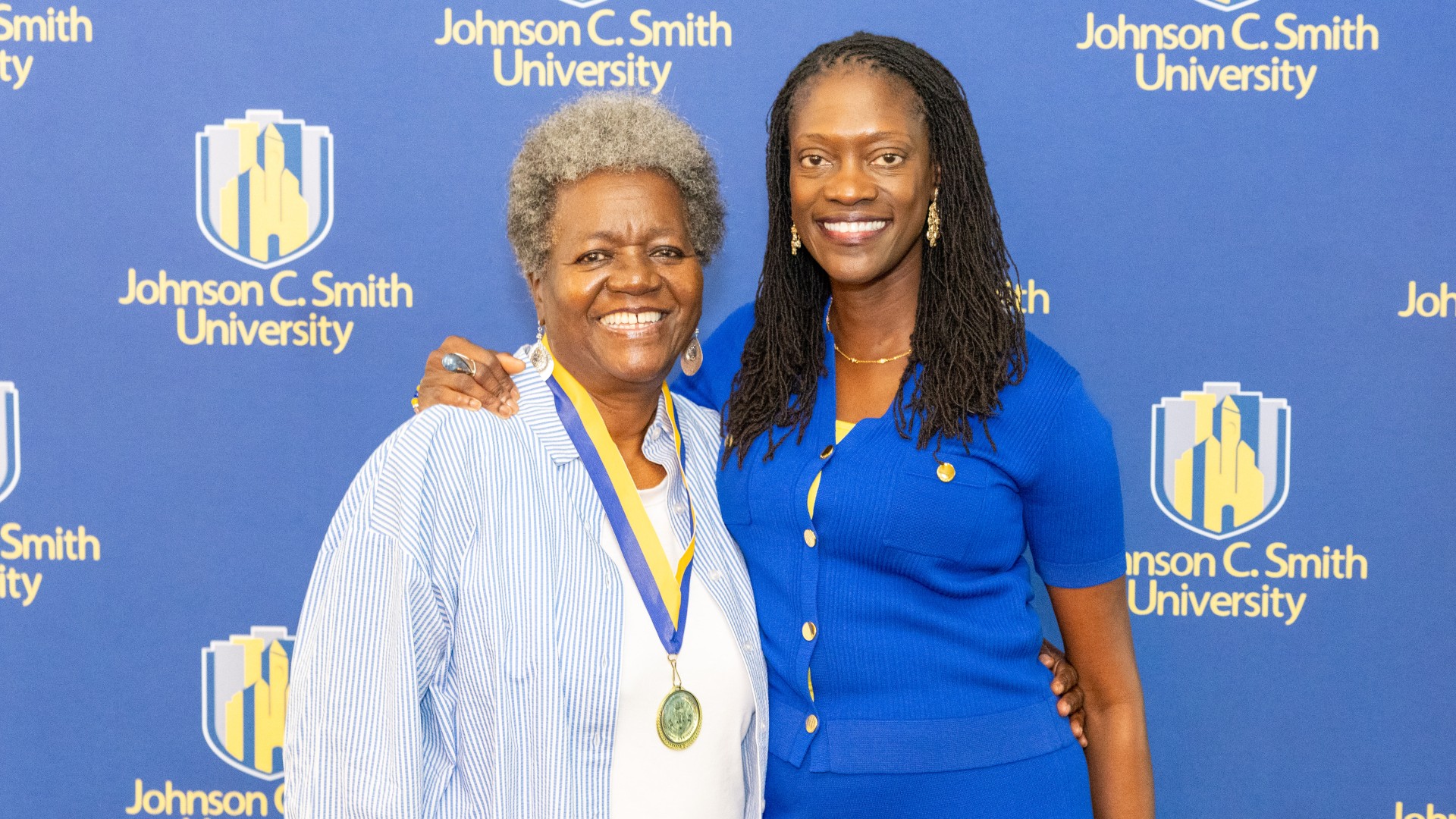 Golden Class medallion with President Kinloch Photos